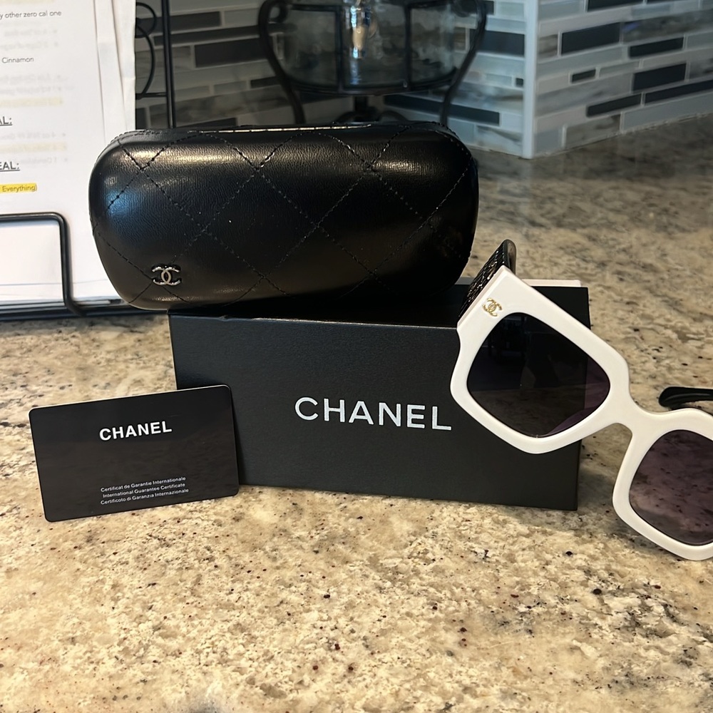 Chanel white frame black quilted arms